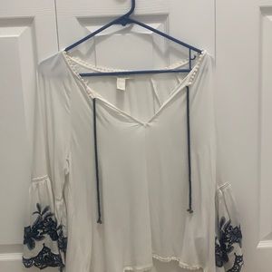 White tunic top with navy blue detailing